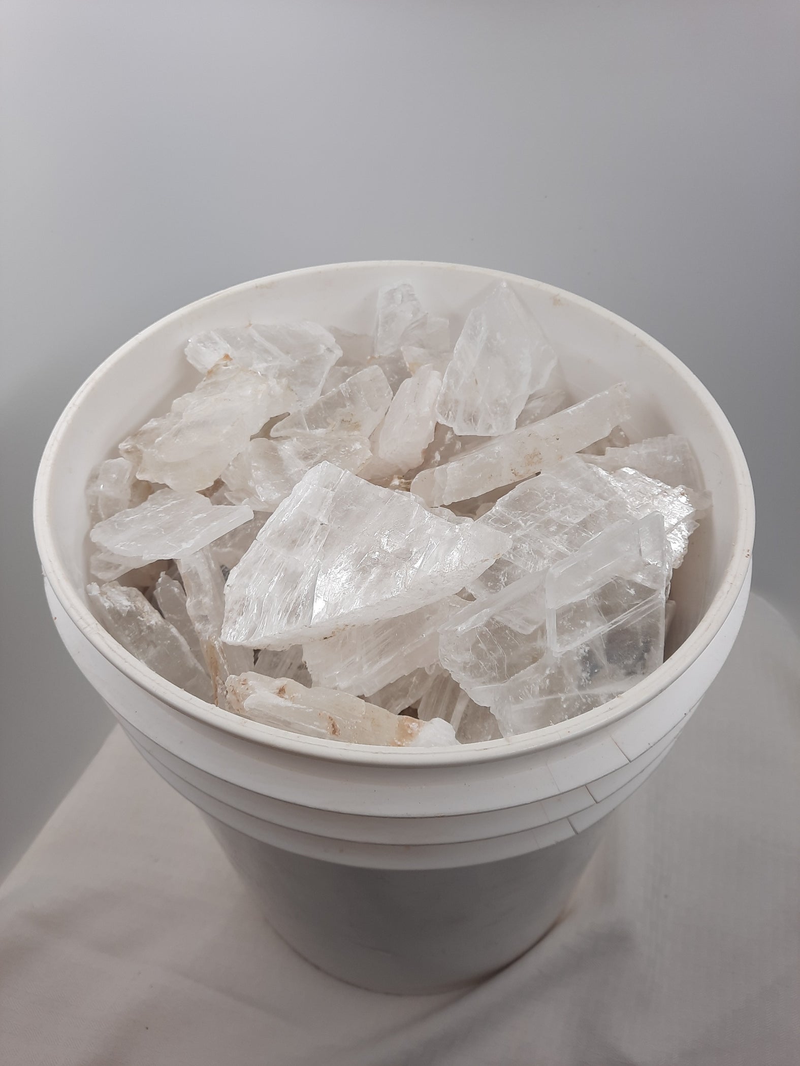 Chunks of clear crystal with white highlights - Selenite Wholesale