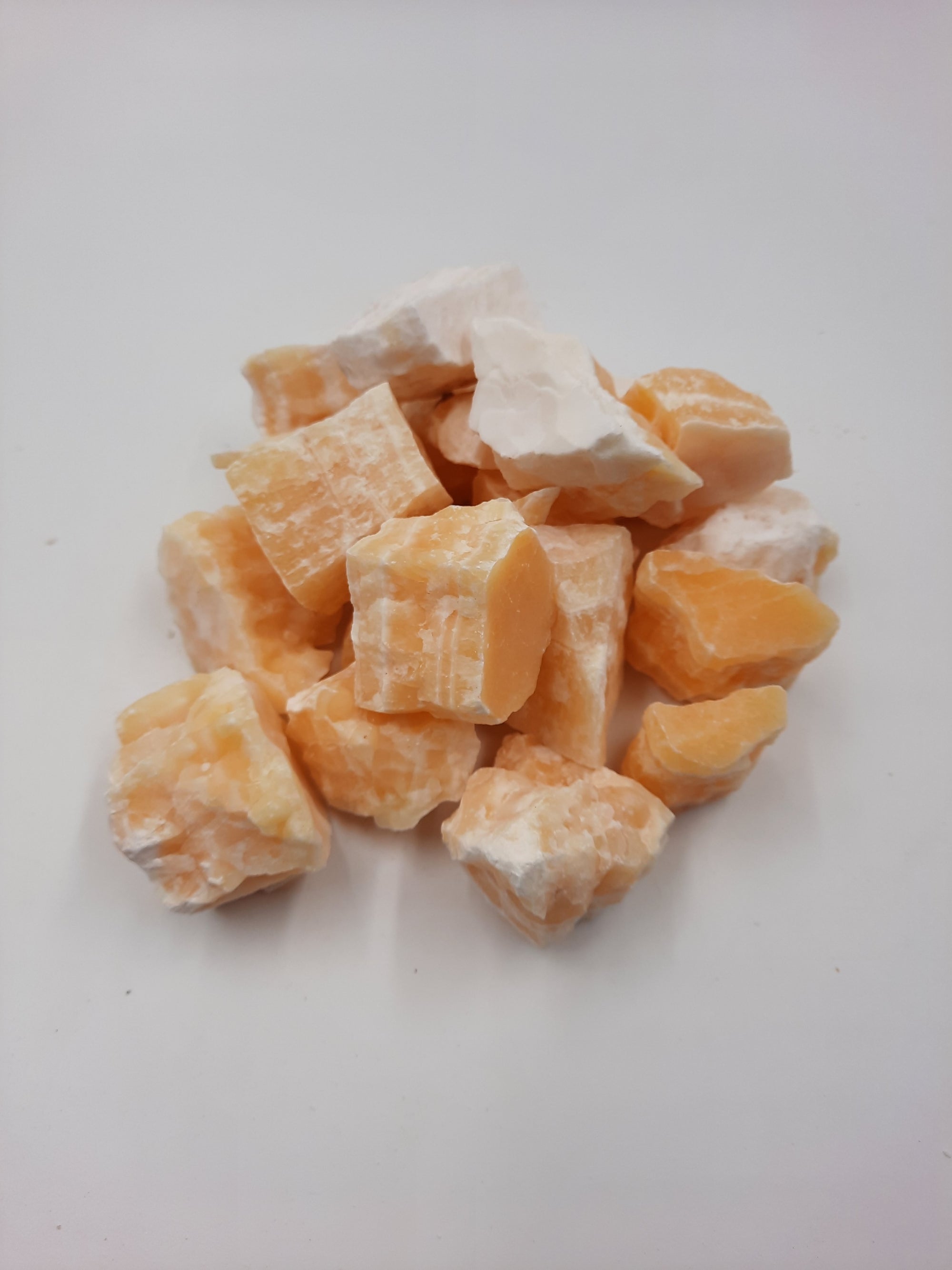 Wholesale group of yellow and white (pina- colada) calcite